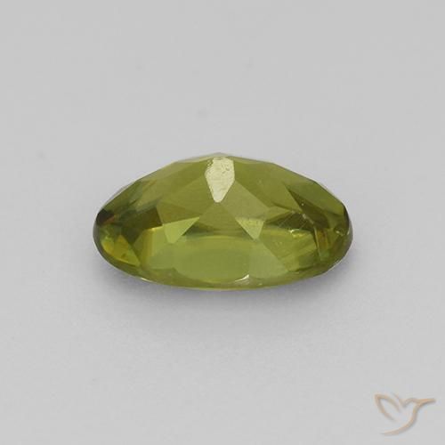 Esfena Verde Terroso Quente Natural 0.57ct, oval, VS