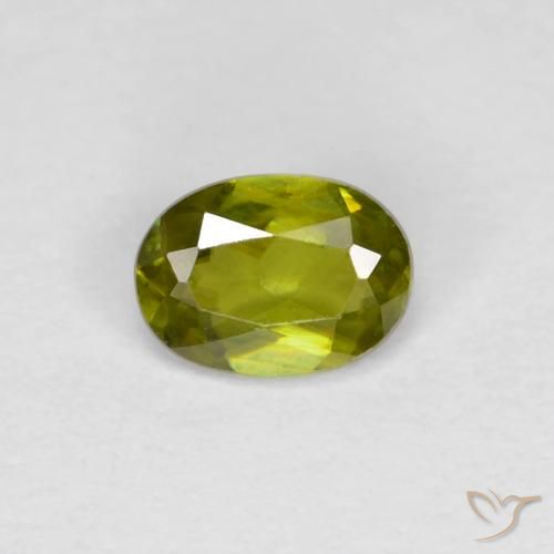 Esfena Verde Terroso Quente Natural 0.40ct, oval, VS