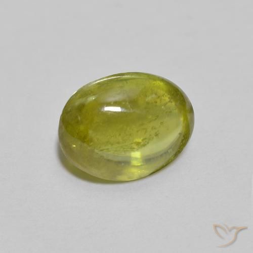 Esfena Verde Terroso Quente Natural 1.40ct, oval, Transparente