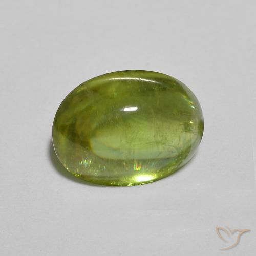 Esfena Medium Dark-Green Natural 1.31ct, oval, Transparente