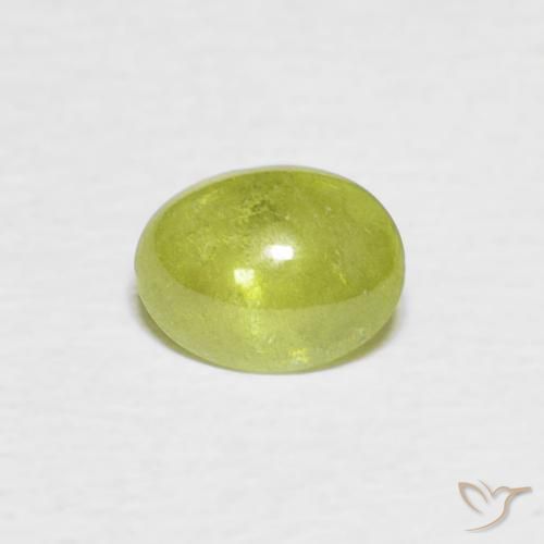 0.83ct Natural Verde médio Esfena, oval, Transparente