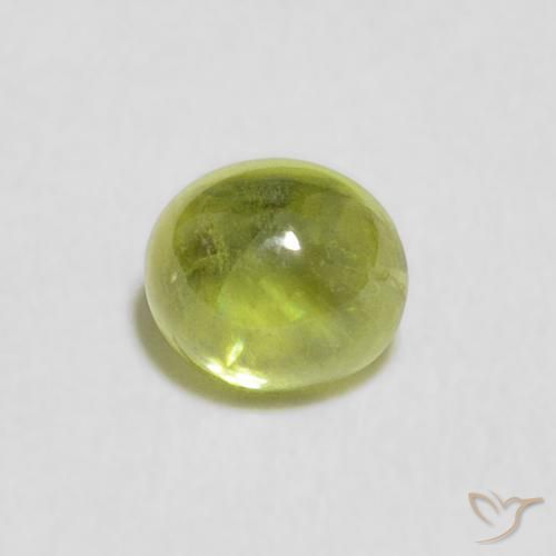 0.67ct Natural verde vivo Esfena, oval, Transparente