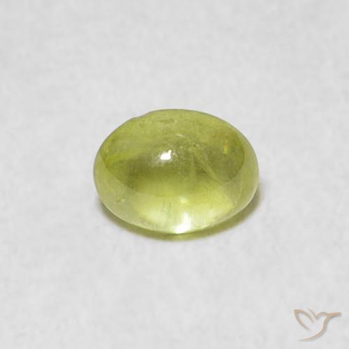 0.77ct Natural Verde limão Esfena, oval, Transparente