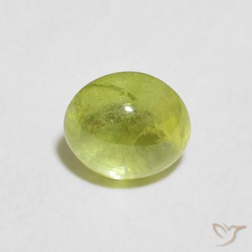 0.85ct Natural Verde oliva Esfena, oval, Transparente