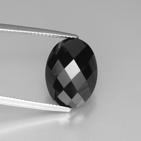 Espinélio preto natural 10,83ct, corte oval, opaco