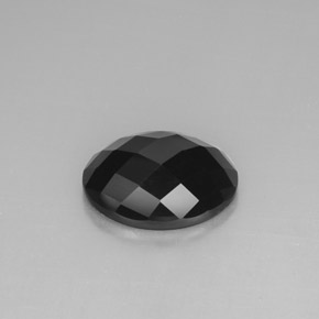 Espinélio preto natural 10,83ct, corte oval, opaco