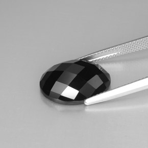 Espinélio preto natural 10,83ct, corte oval, opaco