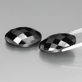 Pedras preciosas de espinélio preto natural de 24,58 ct, corte oval, opaco