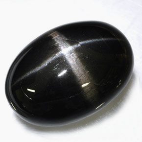 Diopsídio estrela preto natural 39,09ct, corte oval, opaco