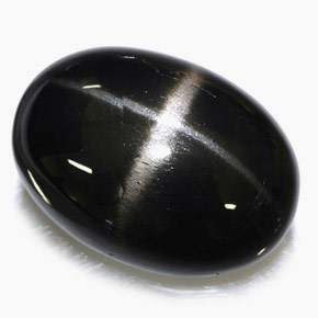 Diopsídio estrela preto natural 39,09ct, corte oval, opaco
