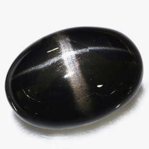 Diopsídio estrela preto natural 39,09ct, corte oval, opaco