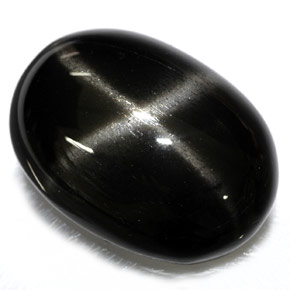 Diopsídio estrela preto natural 26,40ct, corte oval, opaco