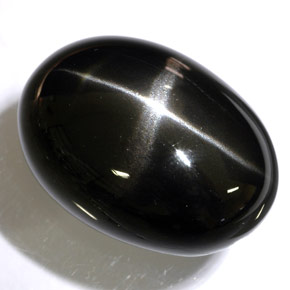 Diopsídio estrela preto natural 48,47ct, corte oval, opaco