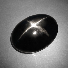 Diopsídio estrela preto natural 37,46ct, corte oval, opaco