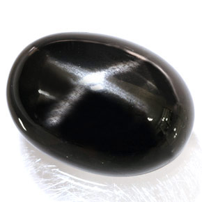 Diopsídio estrela preto natural 34,95ct, corte oval, opaco