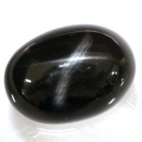 Diopsídio estrela preto natural 34,95ct, corte oval, opaco