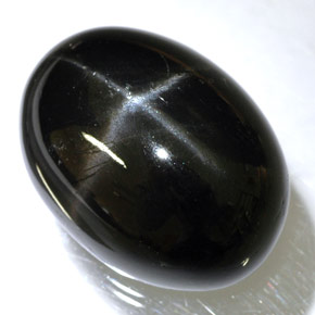 Diopsídio estrela preto natural 24,45ct, corte oval, opaco