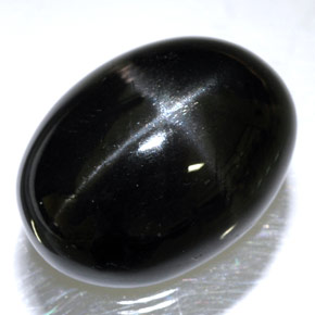 Diopsídio estrela preto natural 24,45ct, corte oval, opaco