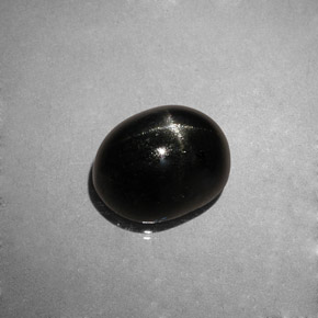 Diopsídio estrela preto natural 4,04ct, corte oval, opaco