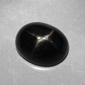 Diopsídio estrela preto natural 3,95ct, corte oval, opaco