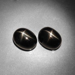 Pedras preciosas de diopsídio estrela preto natural de  ct, corte oval, opaco