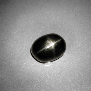 Diopsídio estrela preto natural 2,38ct, corte oval, opaco