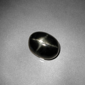 Diopsídio estrela preto natural 2,38ct, corte oval, opaco