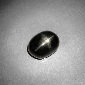 Diopsídio estrela preto natural 2,38ct, corte oval, opaco
