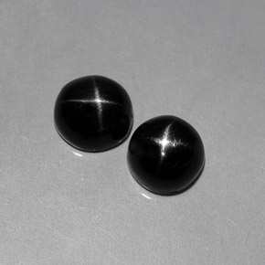 Pedras preciosas de diopsídio estrela preto natural de  ct, corte oval, opaco