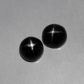 Pedras preciosas de diopsídio estrela preto natural de  ct, corte oval, opaco
