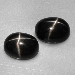 Pedras preciosas de diopsídio estrela preto natural de  ct, corte oval, opaco