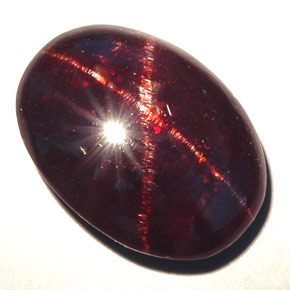 Granada estrela preto natural 15,79ct, corte oval, opaco