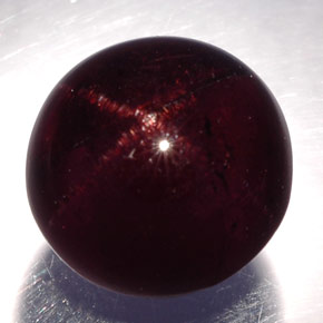 Granada estrela preto natural 10,82ct, corte redondo, opaco