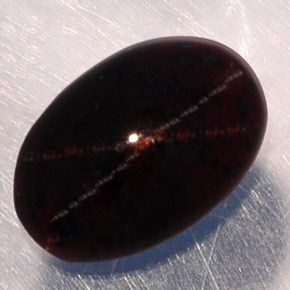 Granada estrela preto natural 3,87ct, corte oval, translúcido