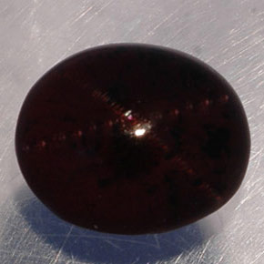 Granada estrela preto avermelhado natural 5,02ct, corte oval, translúcido