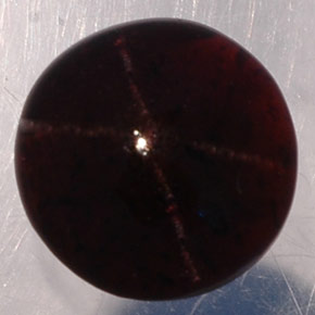 Granada estrela preto natural 4,36ct, corte redondo, translúcido