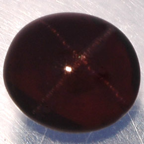 Granada estrela preto natural 3,81ct, corte oval, translúcido