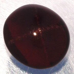 Granada estrela preto natural 3,81ct, corte oval, translúcido