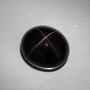 Granada estrela preto natural 35,68ct, corte oval, opaco