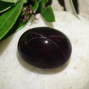 Granada estrela preto natural 31,18ct, corte oval, opaco