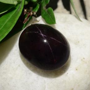 Granada estrela preto natural 31,18ct, corte oval, opaco