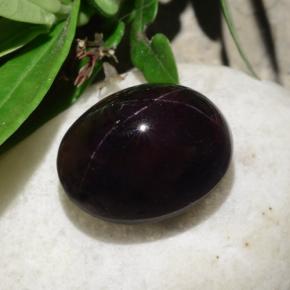 Granada estrela preto natural 31,18ct, corte oval, opaco