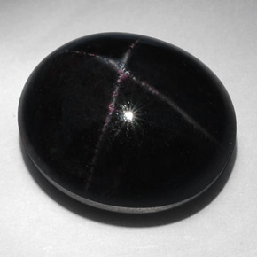 Granada estrela preto natural 52,94ct, corte oval, opaco