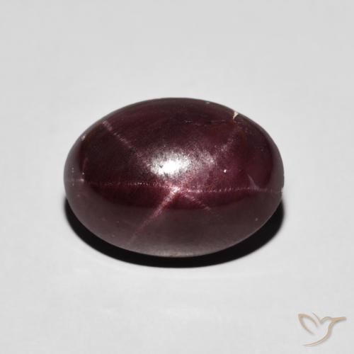 8.11ct Natural vermelho mogno Granada Estrela, oval, Opaco