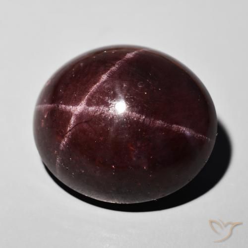 Granada Estrela Vermelho escuro Natural 55.50ct, oval, Opaco
