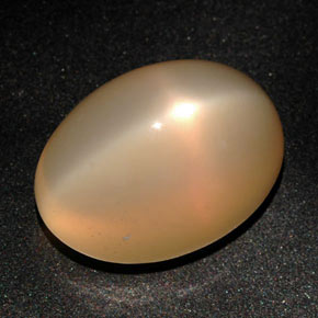Pedra da lua estrela laranja natural 22,59ct, corte oval, translúcido