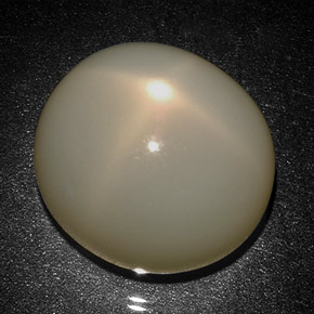 Pedra da lua estrela creme natural 31,27ct, corte oval, translúcido