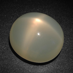 Pedra da lua estrela creme natural 22,83ct, corte oval, translúcido