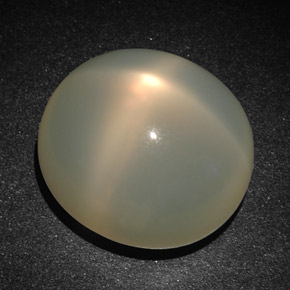 Pedra da lua estrela creme natural 22,83ct, corte oval, translúcido