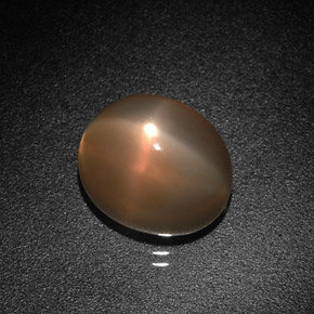 Pedra da lua estrela laranja natural 4,98ct, corte oval, translúcido